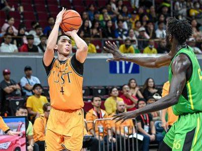 Teammates come to Cabenero's aid in UST's long-awaited UAAP win