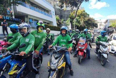 Delivery riders hold protest vs Grab