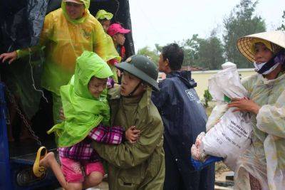 Typhoon Haiyan heads for Vietnam, leaving hundreds dead and thousands homeless in the Philippines