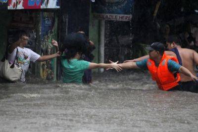 Manila under water as storms and floods devastate Philippines - standard.co.uk - Philippines - Japan - city Manila