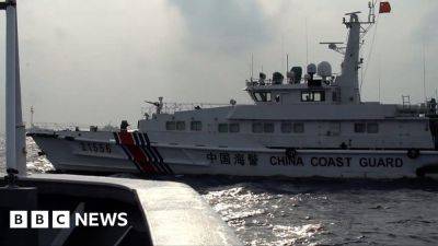 Watch: Formation of Chinese ships blocks Philippine boats - bbc.co.uk - Philippines - China