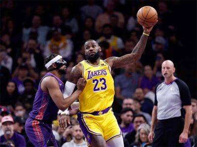 James scores 32 points as Lakers rally to beat Suns, Celtics down Nets
