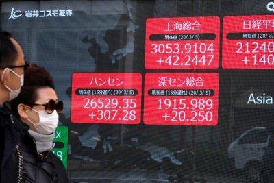 Asian markets struggle, China property help in focus