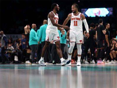 Knicks storm back to stun Heat