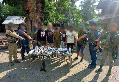 8 suspects held, 14 guns seized - philstar.com - city Zamboanga