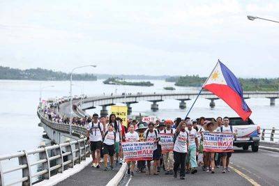 Gaea Katreena Cabico - ‘Climate walkers’ reach Tacloban on eve of Yolanda 10th anniversary - philstar.com - Philippines - city Tacloban - city Manila, Philippines