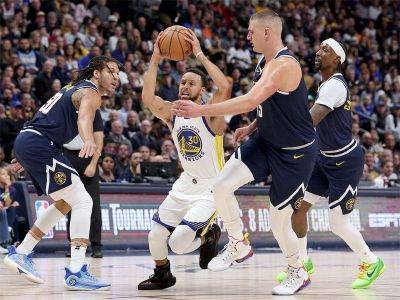 Jokic leads Nuggets past Warriors in NBA thriller