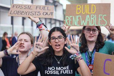 Progress but divisions persist as climate summit fights over fossil fuels