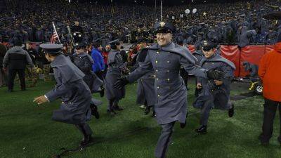 Army holds on with goal-line stand in final seconds, beats Navy 17-11