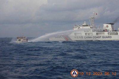 China Coast Guard water cannons, rams Philippine boats on resupply mission