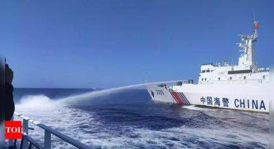 Philippines says Chinese coast guard assaulted its vessels with water cannons for a second day