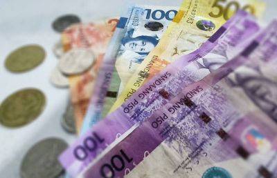 PSEi lower, peso down 35 centavos