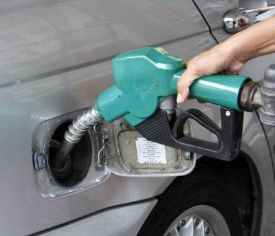 Oil firms lower pump prices