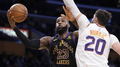 LeBron James leads Lakers to the In-Season Tournament semifinals with a 106-103 win over Suns