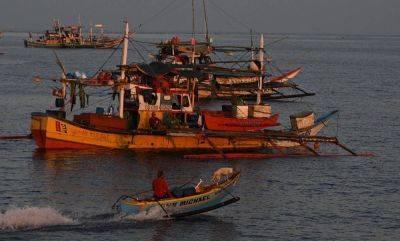 Agence FrancePresse - Filipino fisherman chased by China Coast Guard - manilatimes.net - Philippines - France - China