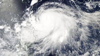JIM GOMEZ - Northern - Typhoon Saola lashes northern Philippines and heads toward Taiwan, southern China - ctvnews.ca - Philippines - China - Hong Kong - Taiwan - Manila
