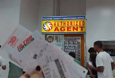 Government employee claims P571.5 million lotto jackpot