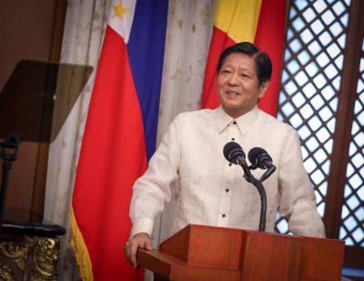 Marcos signs ease of paying taxes law