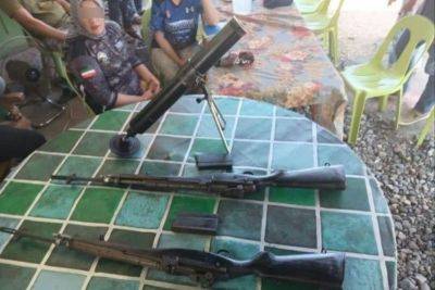 Cotabato City residents surrender combat weapons to military