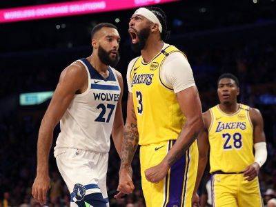 Lakers tame Timberwolves in NBA season opener