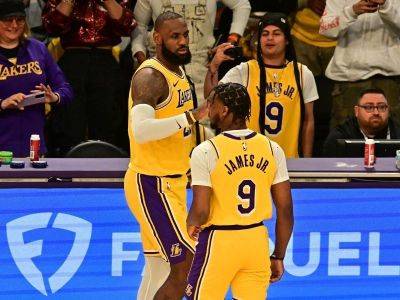 Lakers’ LeBron, Bronny James make NBA history with father-son appearance