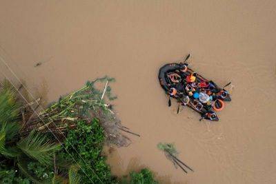 14 dead, thousands evacuated as 'Kristine' batters Philippines