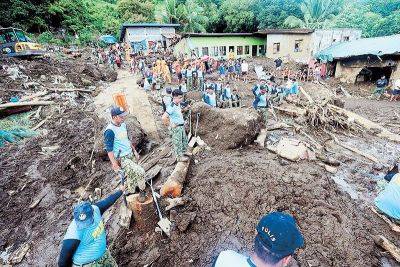 Landslide buries village in Batangas; 14 dead Kristine death toll surges to 46