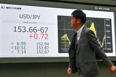 Oil prices tumble as Iran fears ease, yen weakens after Japan polls