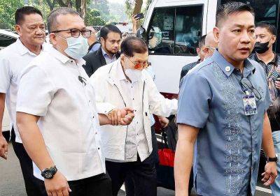 Enrile, 2 others cleared of plunder