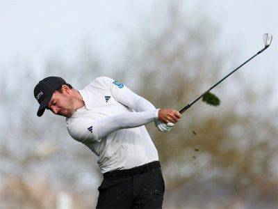 Taylor equals course record, hangs on to share Phoenix Open lead
