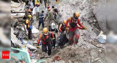 Philippines: Earthquake halts landslide rescue efforts - timesofindia.indiatimes.com - Philippines - Germany - county Centre - region Mindanao