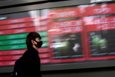 Asian markets mixed ahead of US inflation data