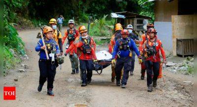 Edward Macapili - 54 dead in a landslide that buried a gold-mining village in south Philippines - timesofindia.indiatimes.com - Philippines - city New Delhi