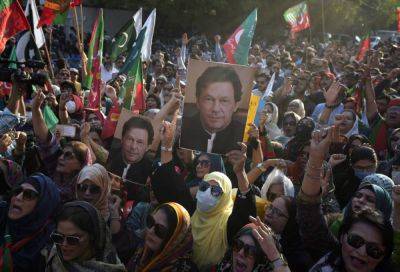 Associated Press - Khan supporters block roads after poll results - manilatimes.net - Pakistan
