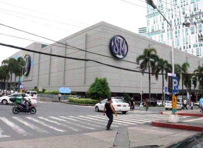 Brix Lelis - Consumer spending lifts SM Investments income - manilatimes.net