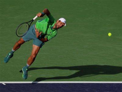 Djokovic claws out win in return to Indian Wells