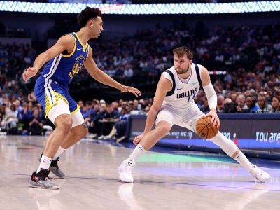 Mavericks down undermanned Warriors; Kings rout Lakers