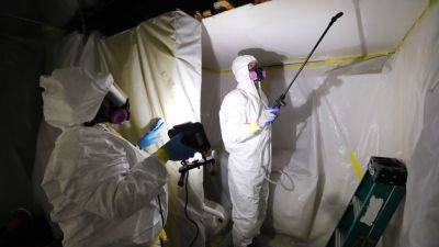 EPA bans asbestos, still in use decades after partial ban