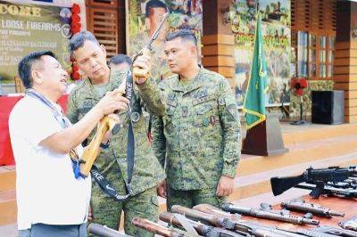 John Unson - Alvin Luzon - Carlito Galvez-Junior - More firearms surrendered by Basilan residents - philstar.com - Philippines - region Office-Bangsamoro - city Zamboanga - province Basilan - city Cotabato, Philippines