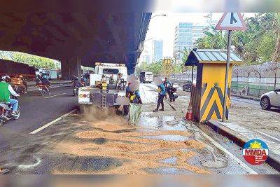 Tanker hits highway post, spills coco oil