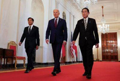 Biden says U.S. support for Philippines, Japan defense ‘ironclad’ amid growing China provocations