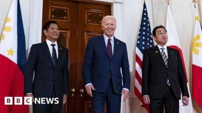 Biden vows 'ironclad' defence of Philippines in South China Sea