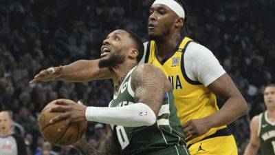 Damian Lillard - Kevin Durant - Devin Booker - Lillard's unusual night in Bucks' win includes 35 points in first half and 0 in second half - apnews.com - Los Angeles - state Indiana - county Bucks - city Milwaukee - city New Orleans