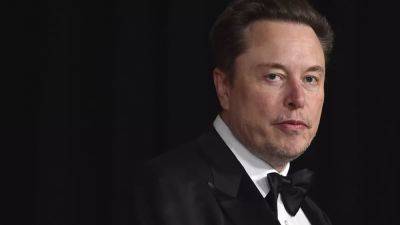 Elon Musk says he's planning to charge 'a small fee' for new users to interact on X