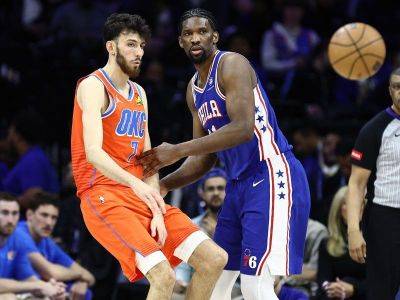 Sixers escape Thunder on Embiid’s return