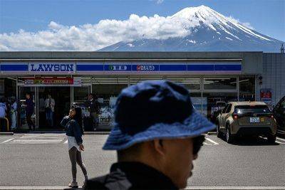 Japan's Mount Fuji barrier delayed