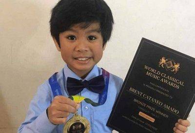 Multi-awarded Bicolano pianist boy invited to play in Carnegie Hall, New York