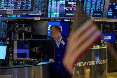 Stock markets diverge on eve of key US inflation data