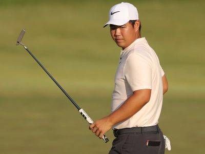 Korea's Tom Kim smiles his way to opening 66 at PGA Championship