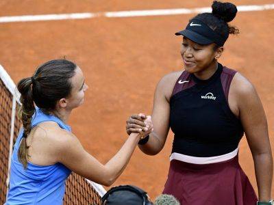 Osaka wins in Rome after 3-year absence